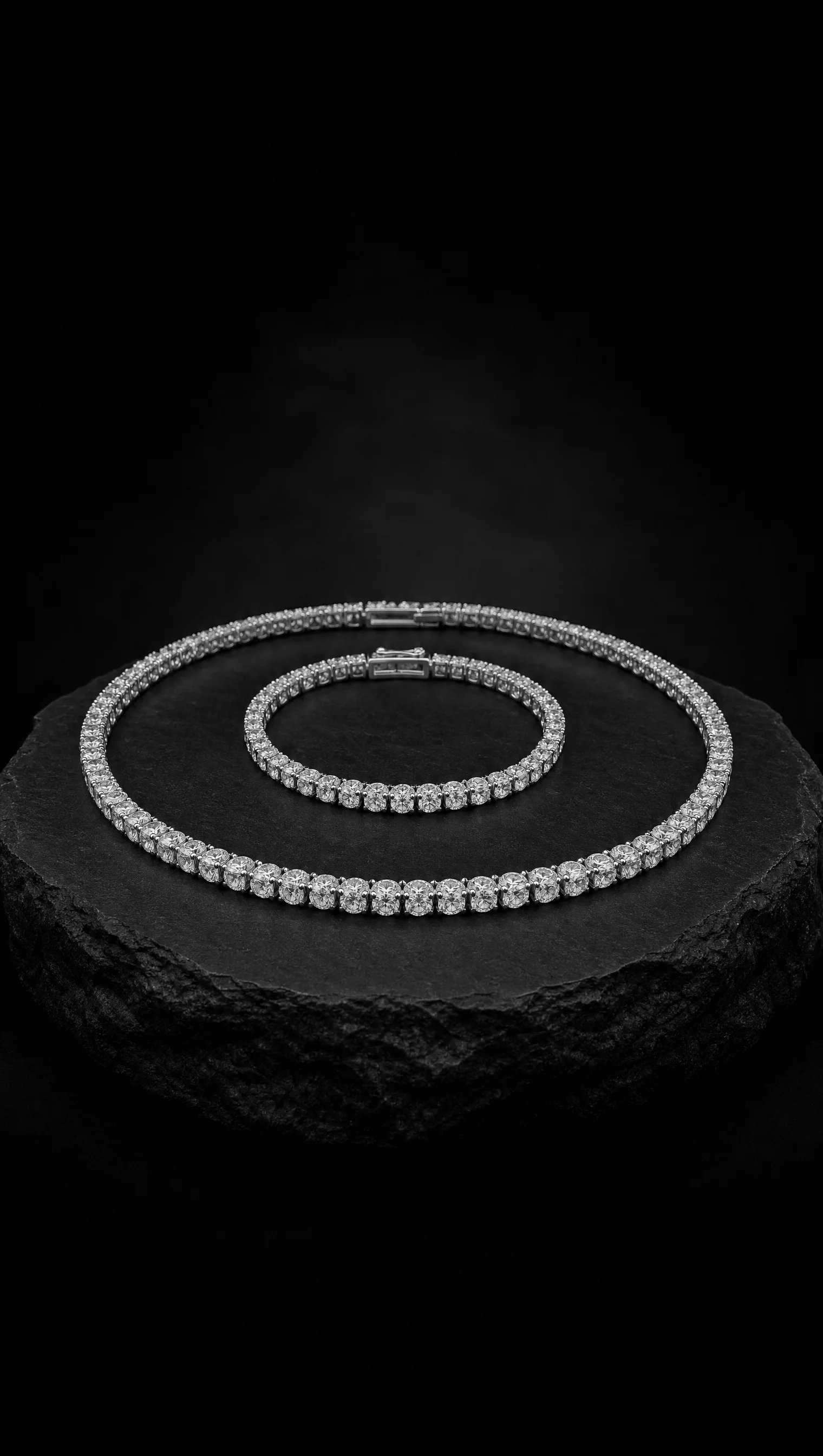 Diamond rivière necklace and matching line bracelet nested together
